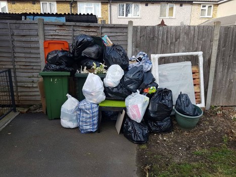 Waste collection truck in North Finchley